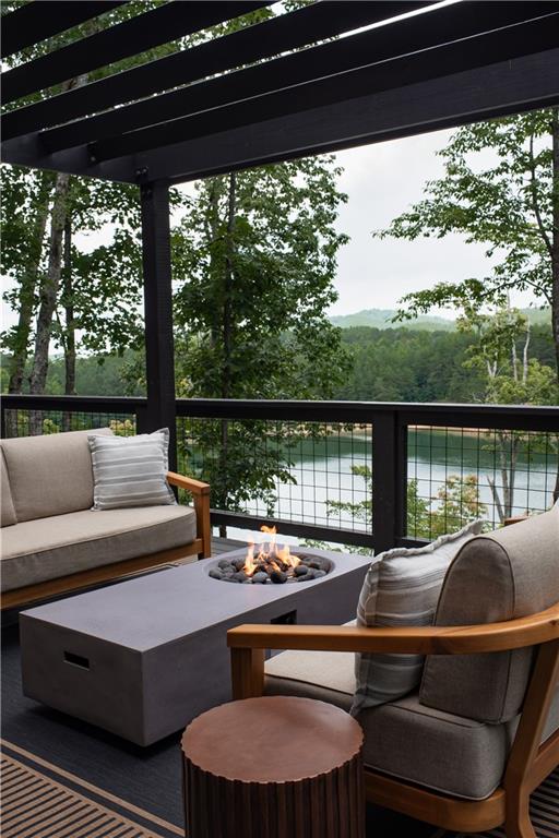 71 Geyser Court Ranger, GA 30734 - Photo 34 of 57 a outdoor sitting area with furniture and a lake view