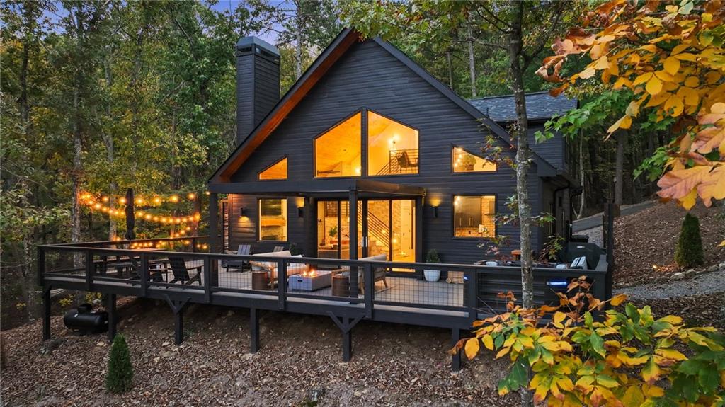 71 Geyser Court Ranger, GA 30734 - Photo 4 of 57 a backyard of a house with wooden floor and outdoor seating