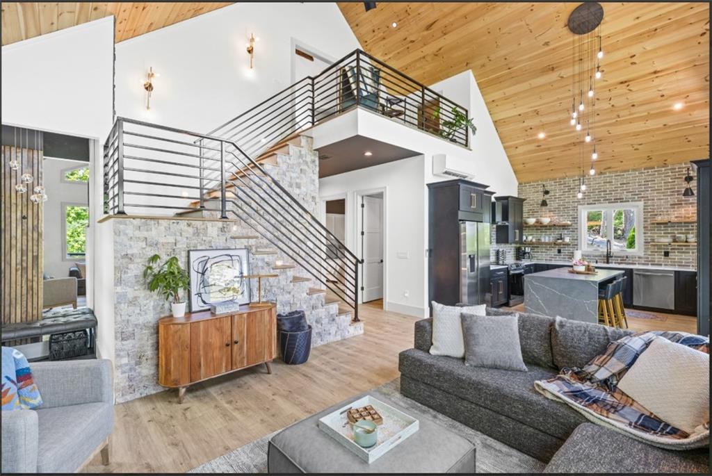 71 Geyser Court Ranger, GA 30734 - Photo 9 of 57 a living room with furniture and a painting on the wall