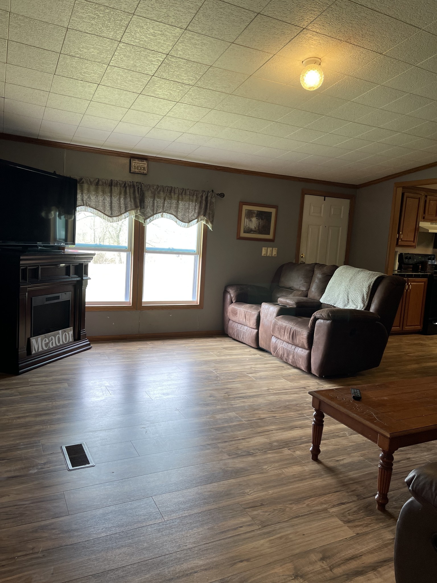 2779 Highland Road Lafayette, TN 37083 - Photo 5 of 13 a living room with furniture and a fireplace