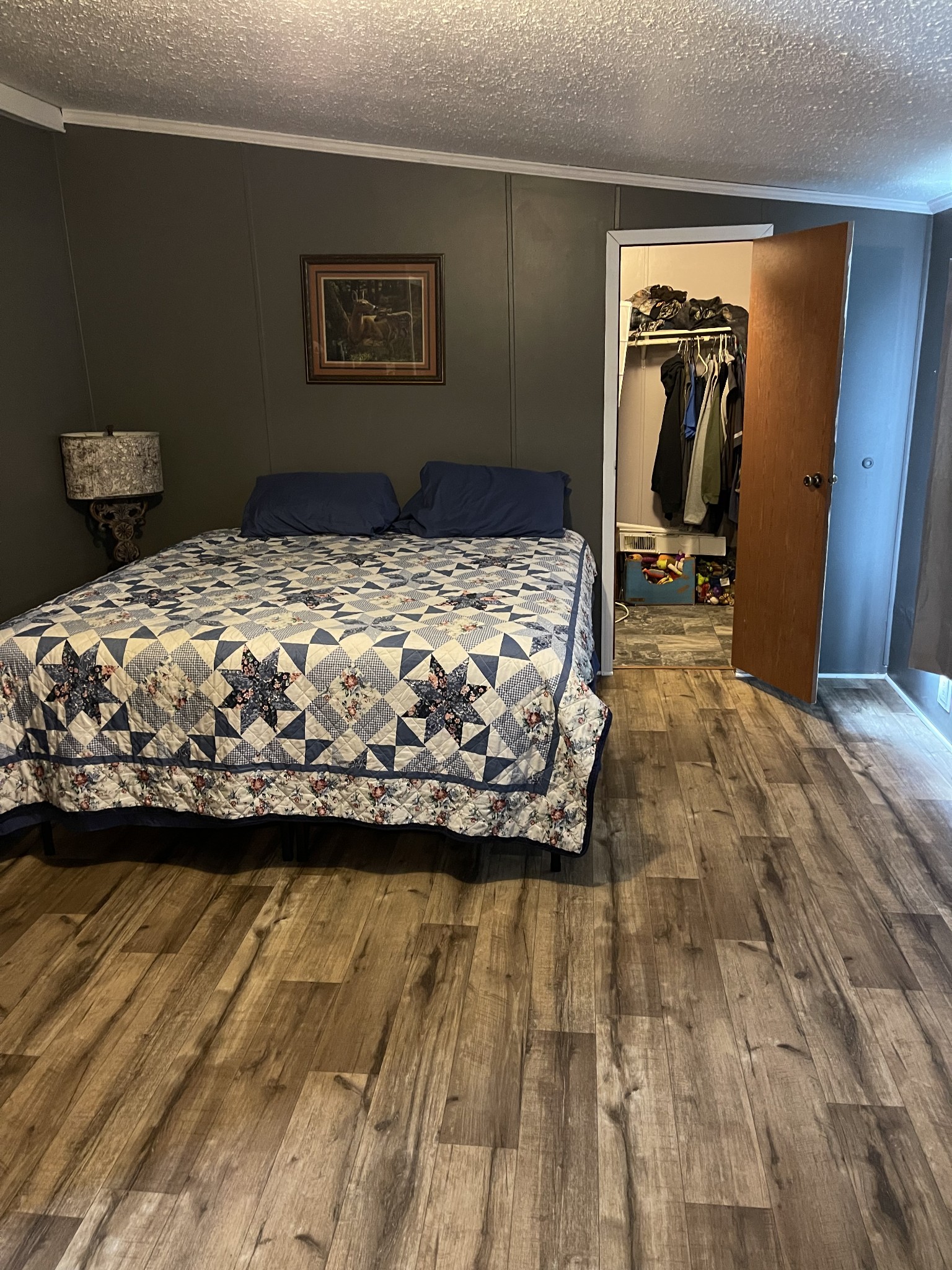 2779 Highland Road Lafayette, TN 37083 - Photo 9 of 13 a bedroom with a bed and mirror