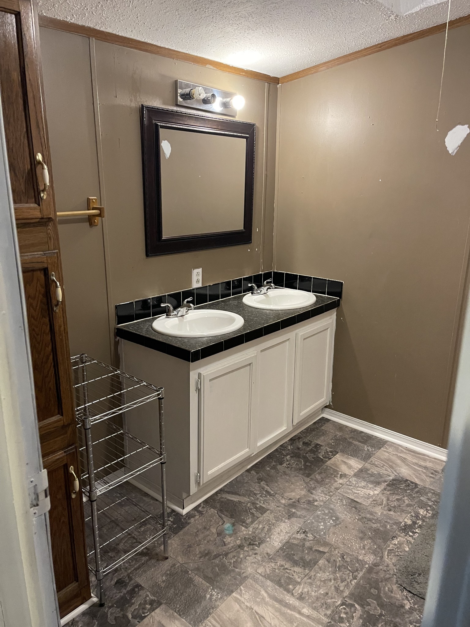 2779 Highland Road Lafayette, TN 37083 - Photo 10 of 13 a bathroom with a sink and a mirror