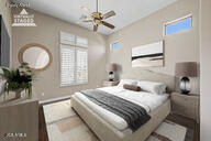 4046 North Silver Ridge Circle Mesa, AZ 85207 - Photo 34 of 61 a bedroom with a bed a chandelier and a window