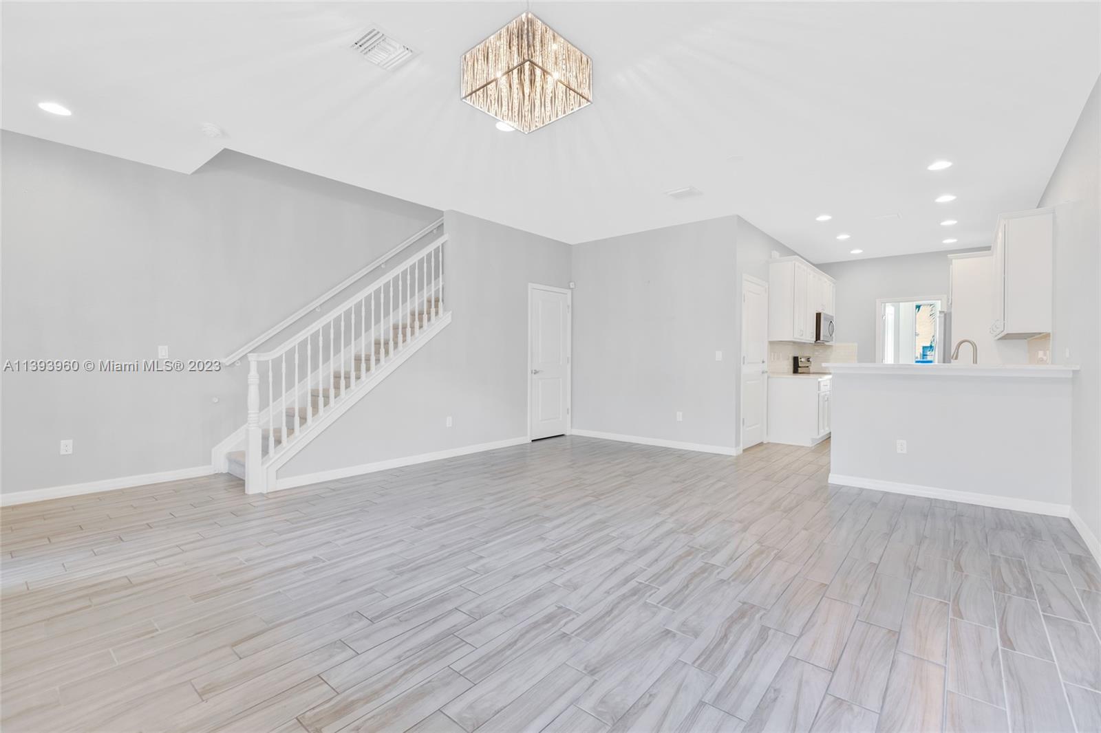 Hillcrest Hollywood, FL 33021 - Photo 3 of 30 a view of an empty room with wooden floor