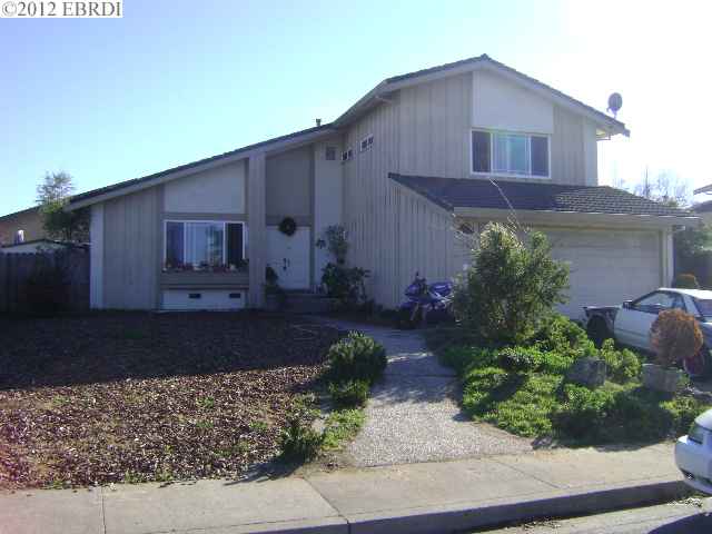 1160 Stirling Drive Rodeo, CA 94572 - Photo 1 of 1 a front view of a house with garden