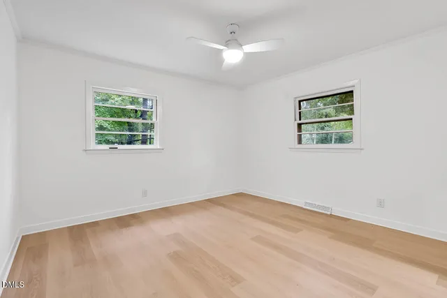 an empty room with a bathroom