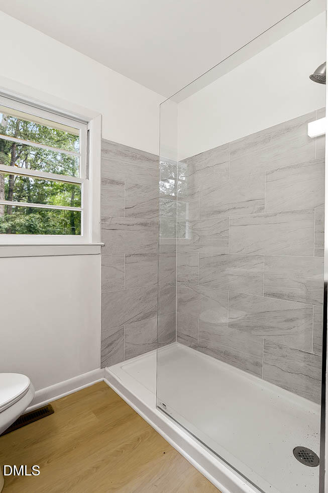 3508 Old US 1 Highway New Hill, NC 27562 - Photo 23 of 23 a bathroom with a shower and a toilet