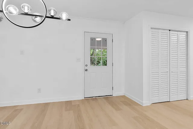 a view of a kitchen with a sink and cabinet area