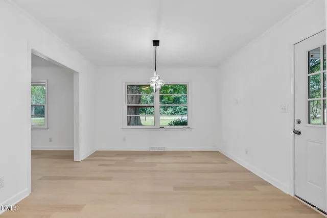 a kitchen with appliances cabinets and a sink