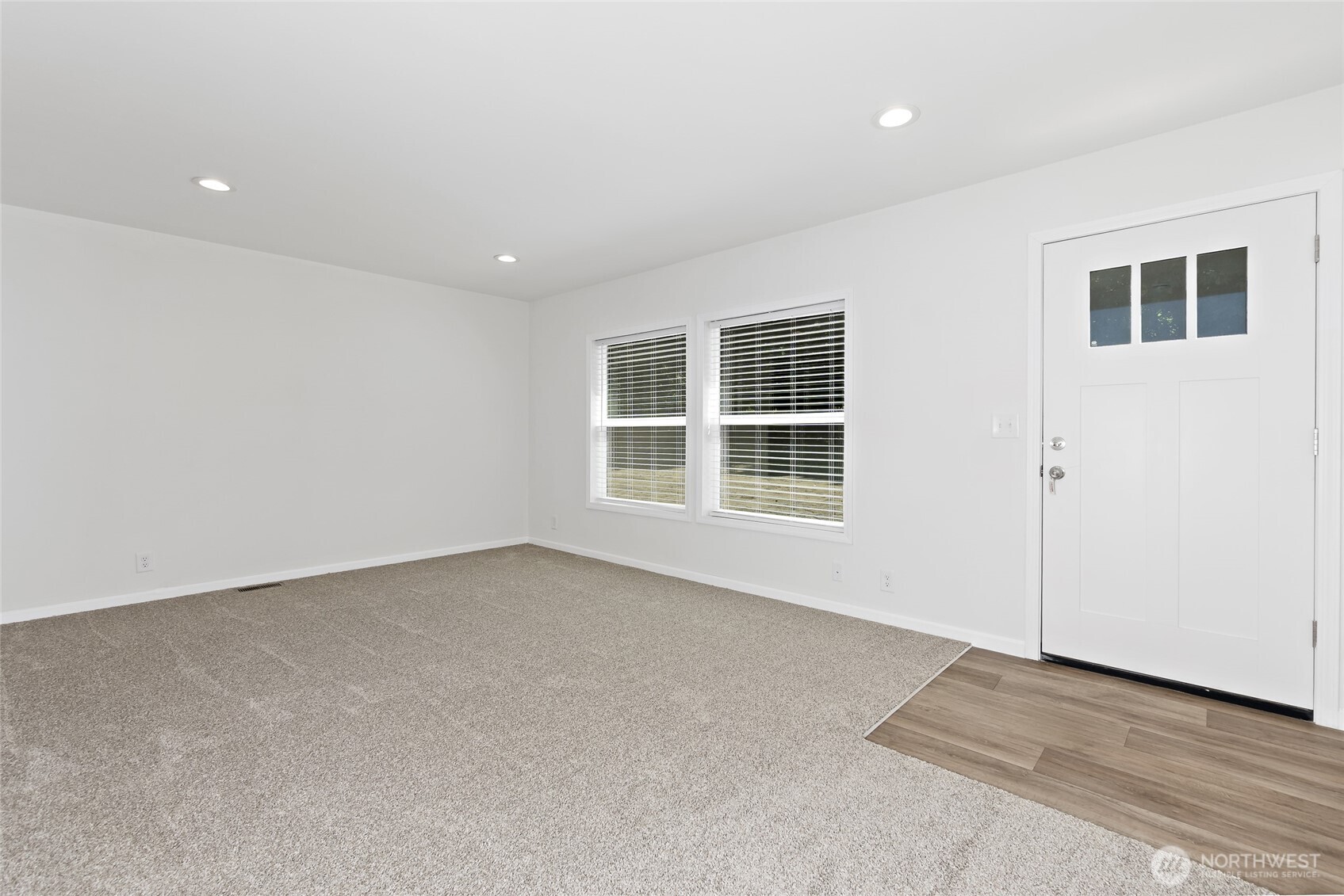 17217 80th Street Southwest Longbranch, WA 98351 - Photo 6 of 39 an empty room with windows