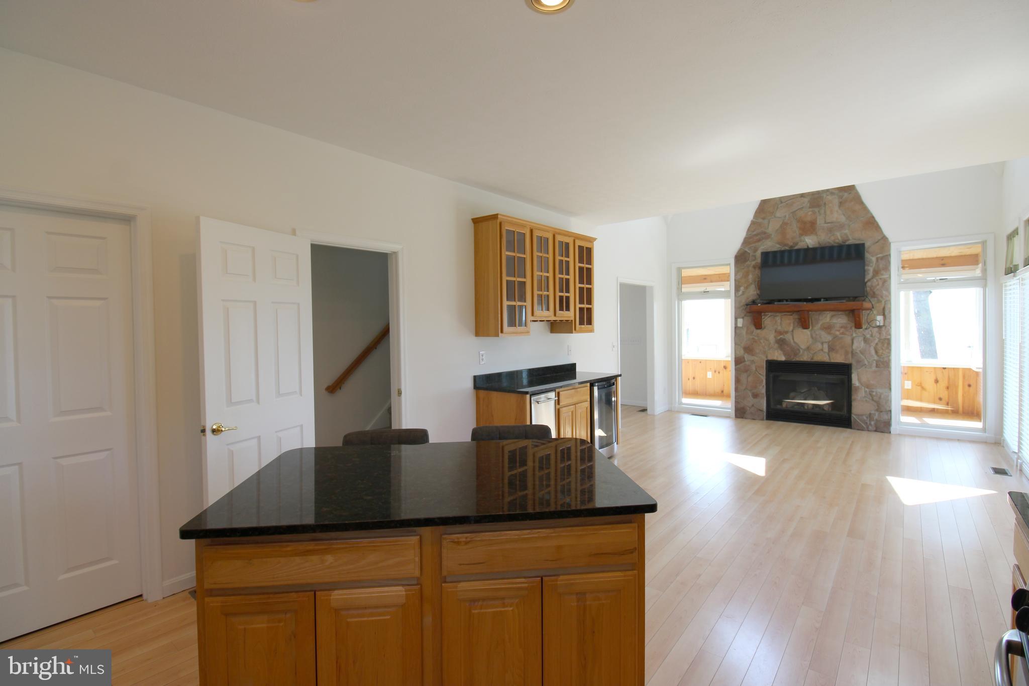 40461 Old Breton Beach Road Leonardtown, MD 20650 - Photo 15 of 61 a living room with furniture and a fireplace
