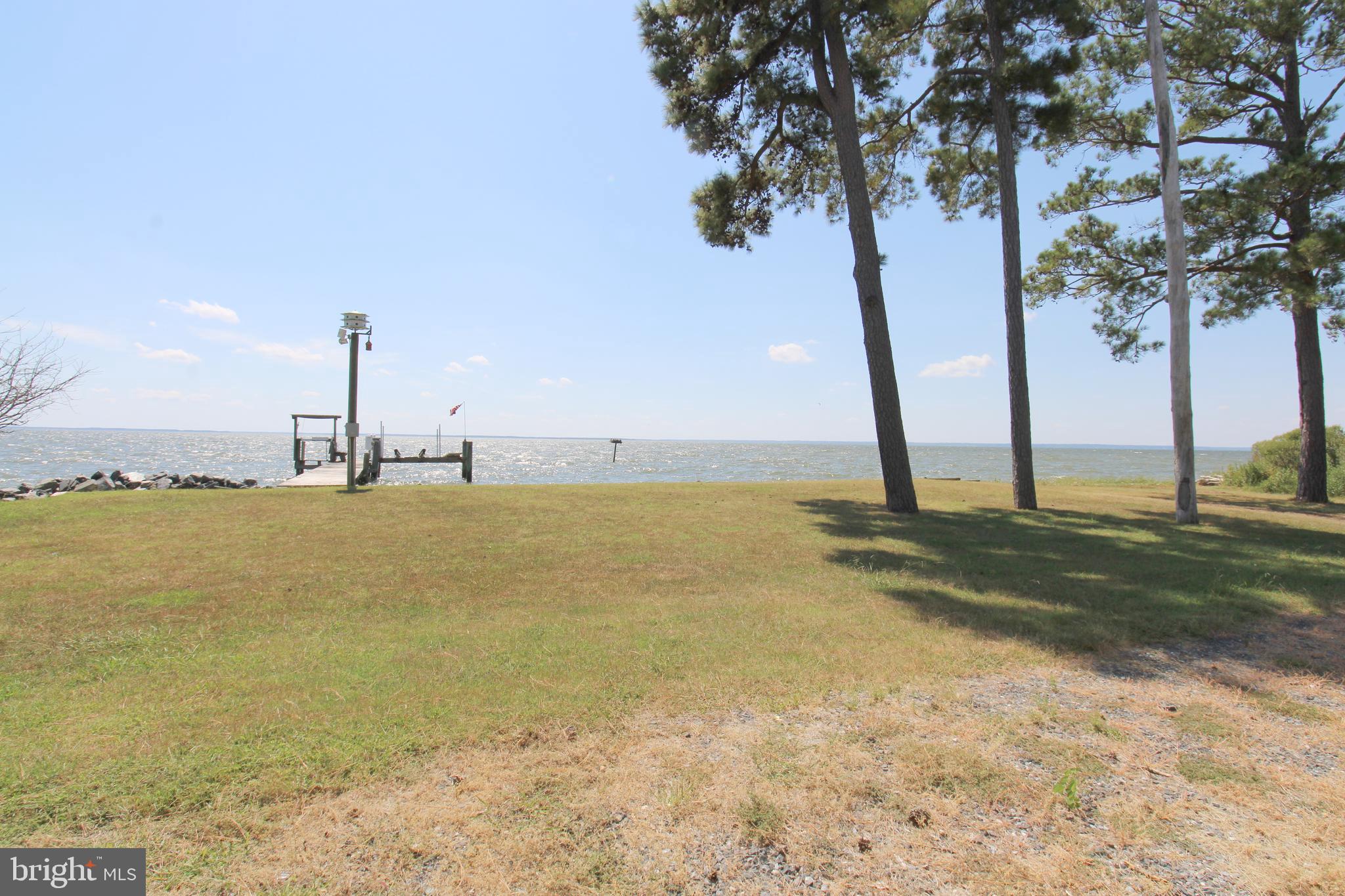 40461 Old Breton Beach Road Leonardtown, MD 20650 - Photo 57 of 61 a view of a ocean with a mountain