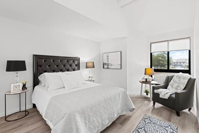 a bed room with a bed and a couch