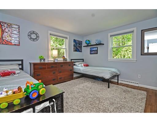 16 Smart Road Acton, MA 01720 - Photo 13 of 33 a bedroom with a bed a window and dresser
