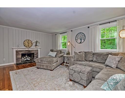 16 Smart Road Acton, MA 01720 - Photo 8 of 33 a living room with furniture and a fireplace