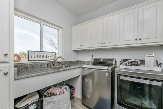 a bedroom with a bed and a desk