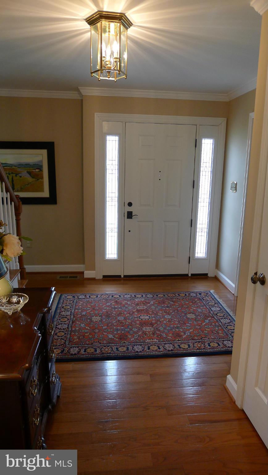 10713 Cross School Road Reston, VA 20191 - Photo 6 of 30 Beautiful foyer with stained glass sidelights.