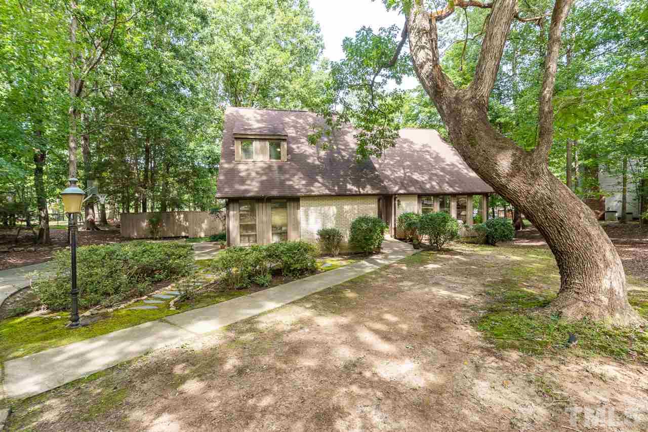 11621 Coachmans Way Raleigh, NC 27614 - Photo 2 of 30 a view of a yard in front of house
