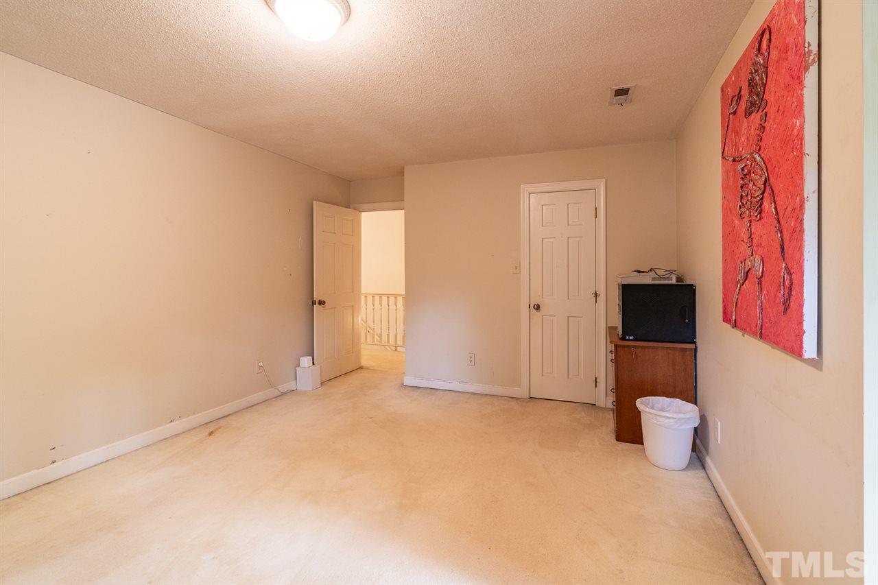 11621 Coachmans Way Raleigh, NC 27614 - Photo 18 of 30 a view of an empty room
