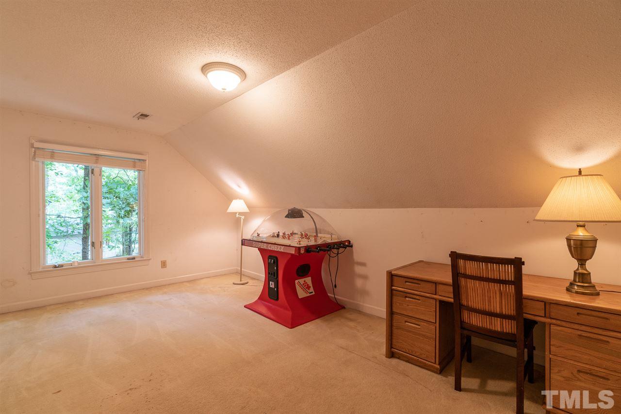 11621 Coachmans Way Raleigh, NC 27614 - Photo 19 of 30 a view of a room with furniture window and outside view