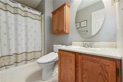 a view of an empty room and entryway