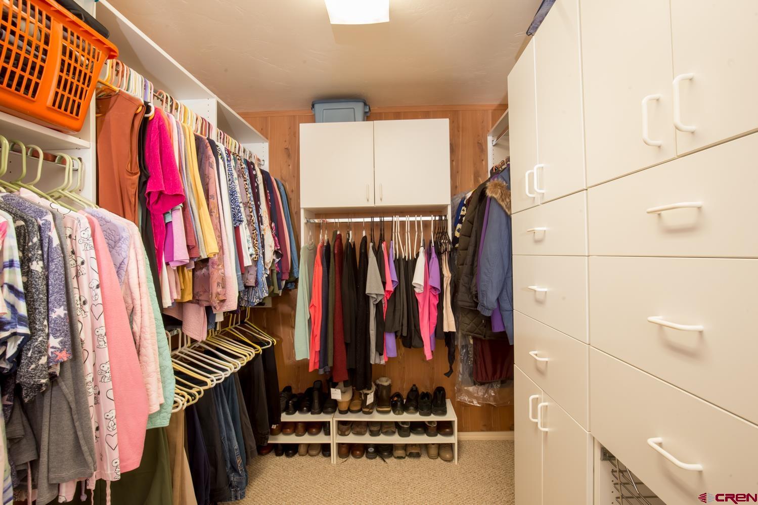 334 Jenkins Ranch Road Durango, CO 81301 - Photo 22 of 35 a view of walk in closet with clothes