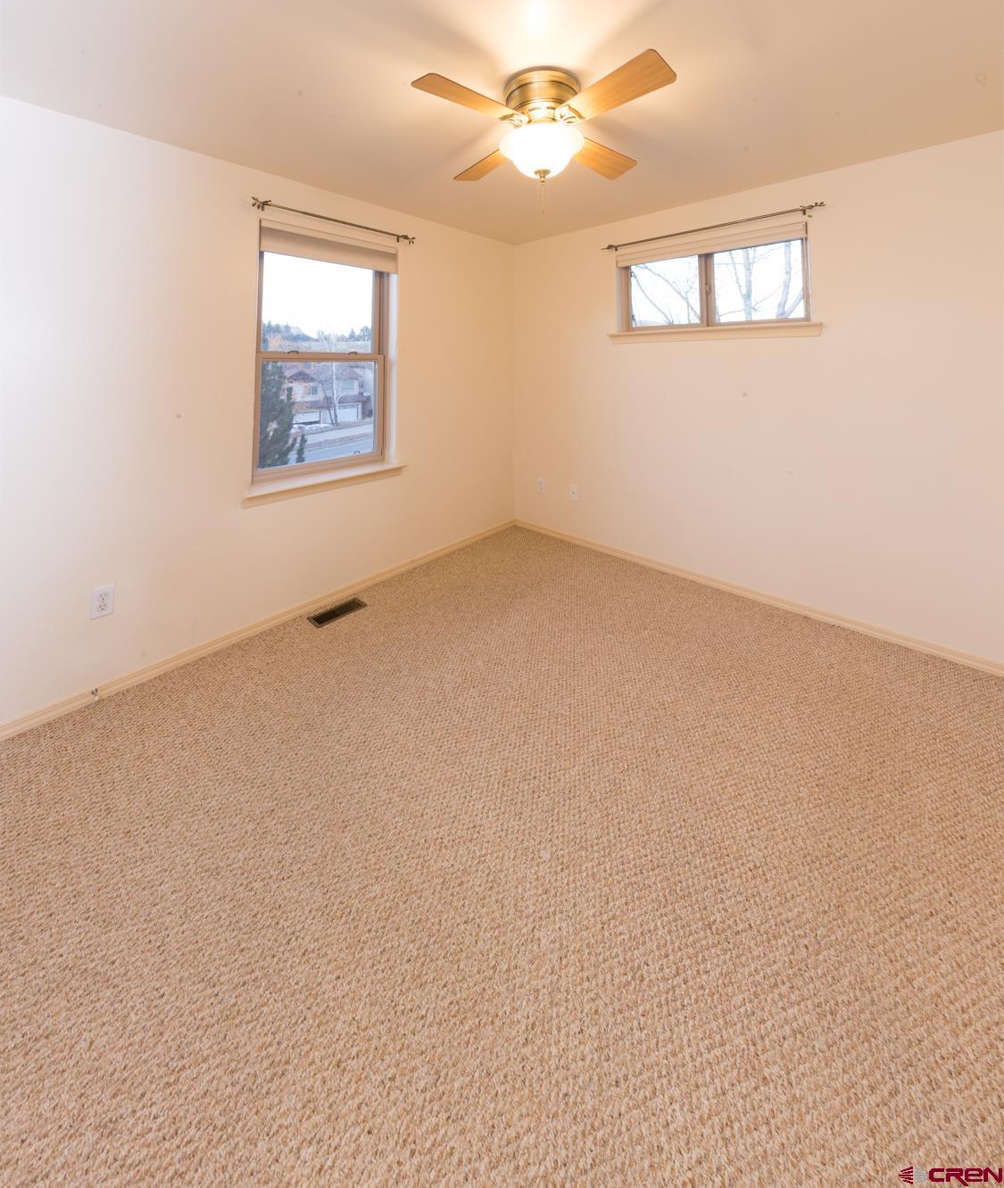 334 Jenkins Ranch Road Durango, CO 81301 - Photo 24 of 35 an empty room with windows