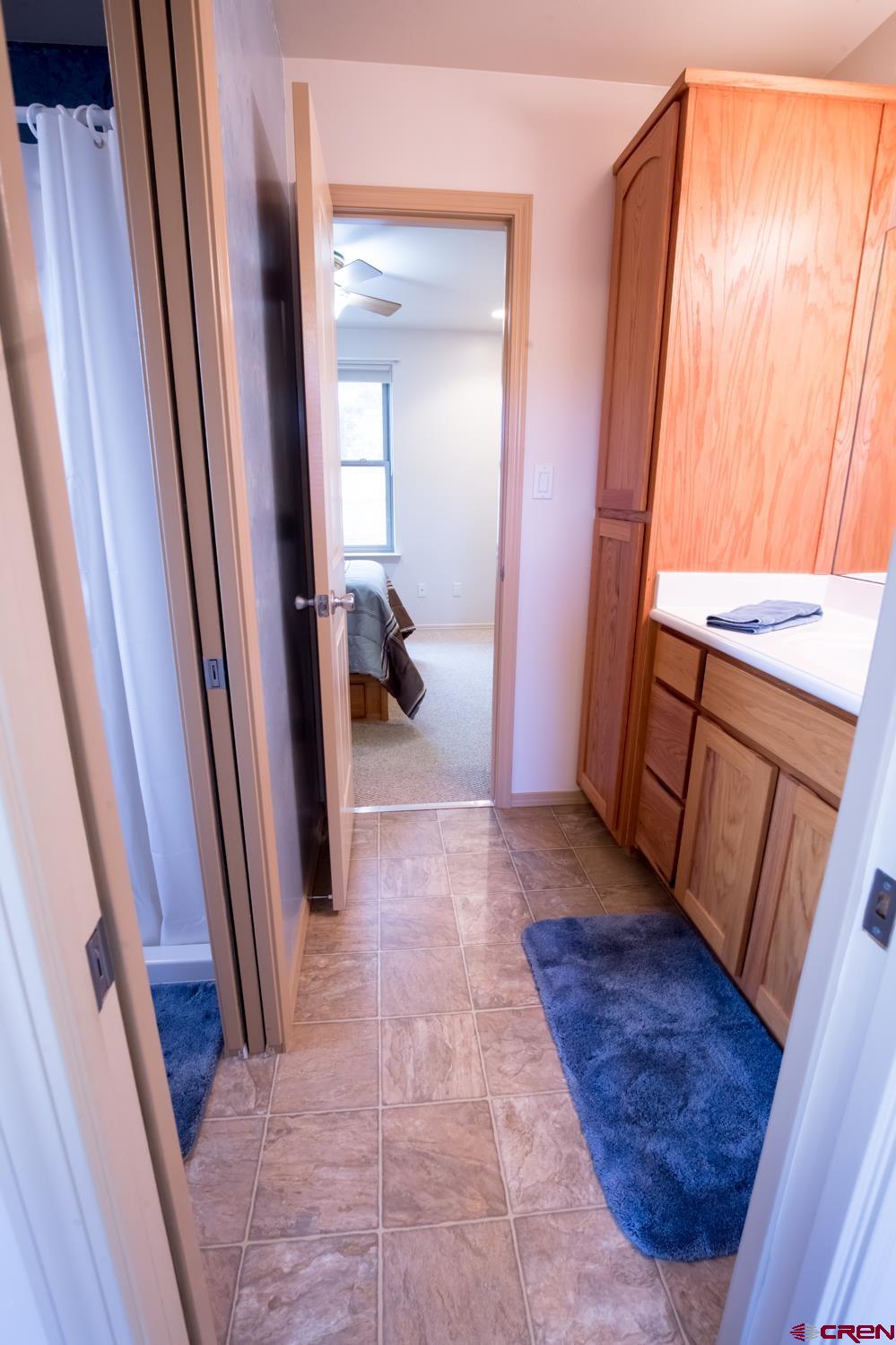 334 Jenkins Ranch Road Durango, CO 81301 - Photo 28 of 35 a view of a hallway and a livingroom with furniture