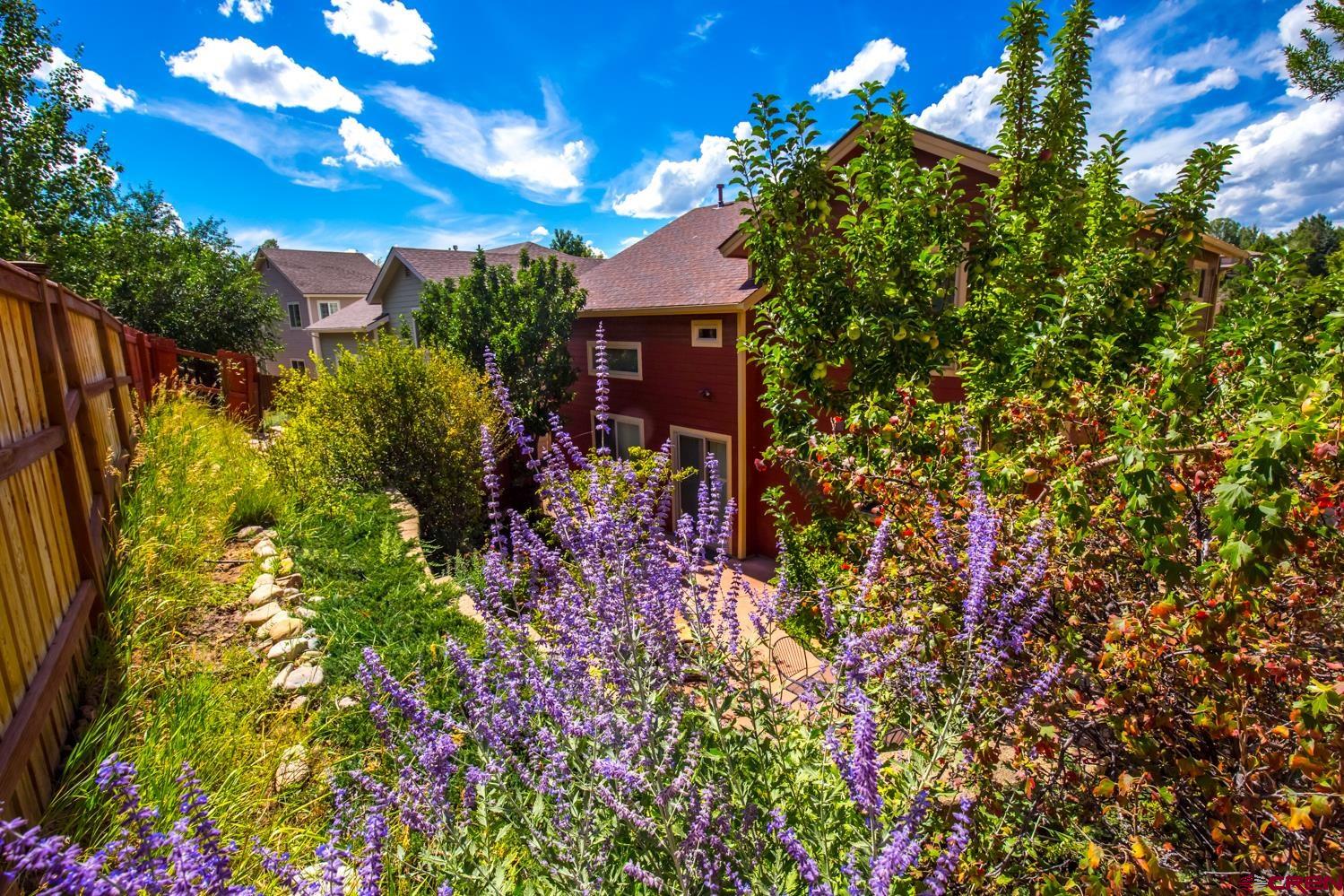 334 Jenkins Ranch Road Durango, CO 81301 - Photo 6 of 35 a view of a house with a tree