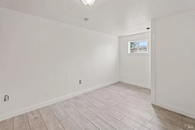 an empty room with window