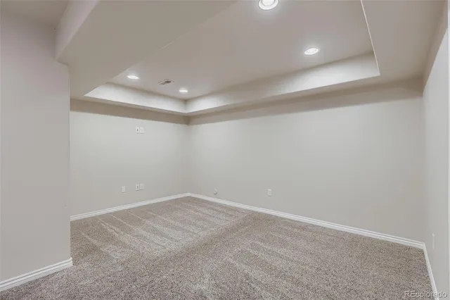 a bathroom with a toilet a sink and shower