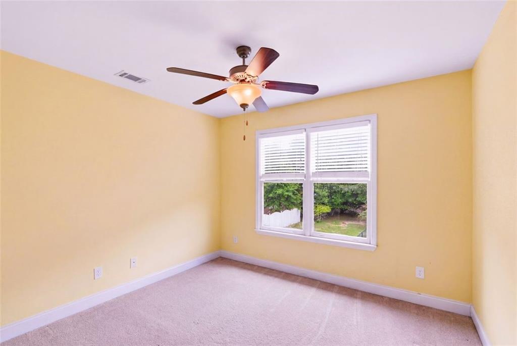 3420 Bulloch Lake Road Loganville, GA 30052 - Photo 42 of 57 a view of an empty room with a window