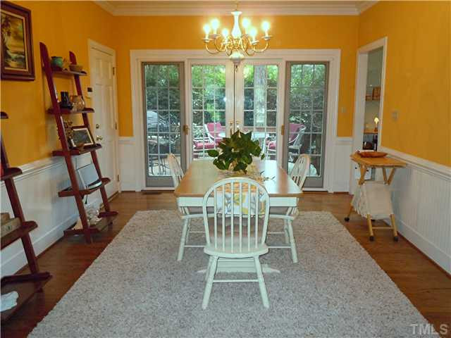 4620 Thendara Way Raleigh, NC 27612 - Photo 3 of 18 LOVE THE FORMAL DINING WITH HARDWOOD FLOORS / SLIDING FRENCH DOORS TO DECK. Dining Room