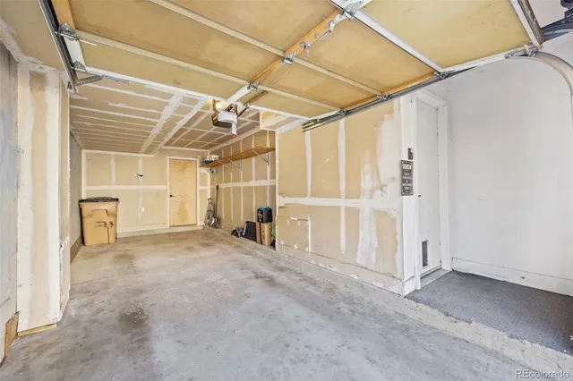 a view of a room with wooden walls