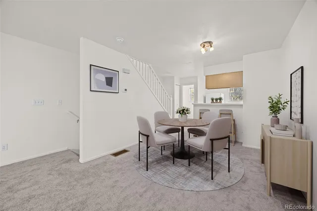a view of a dining room with furniture