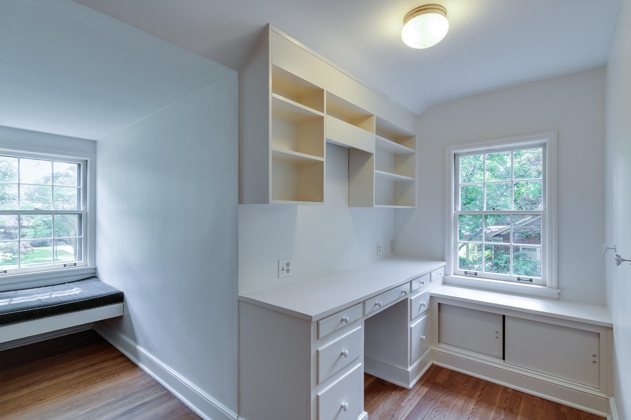 359 Roseland Place Memphis, TN 38111 - Photo 30 of 38 Unfurnished office with built in desk and dark hardwood / wood-style flooring