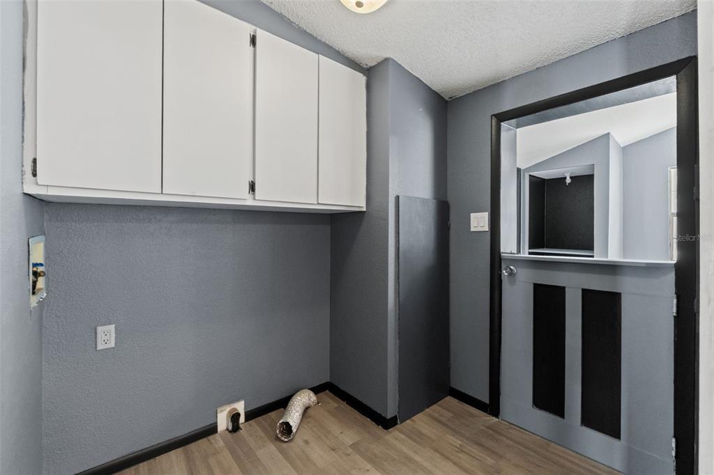 7610 County Road 663 Bushnell, FL 33513 - Photo 13 of 43 a view of room with wooden floor