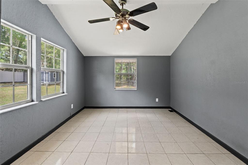 7610 County Road 663 Bushnell, FL 33513 - Photo 28 of 43 a view of an empty room with a window