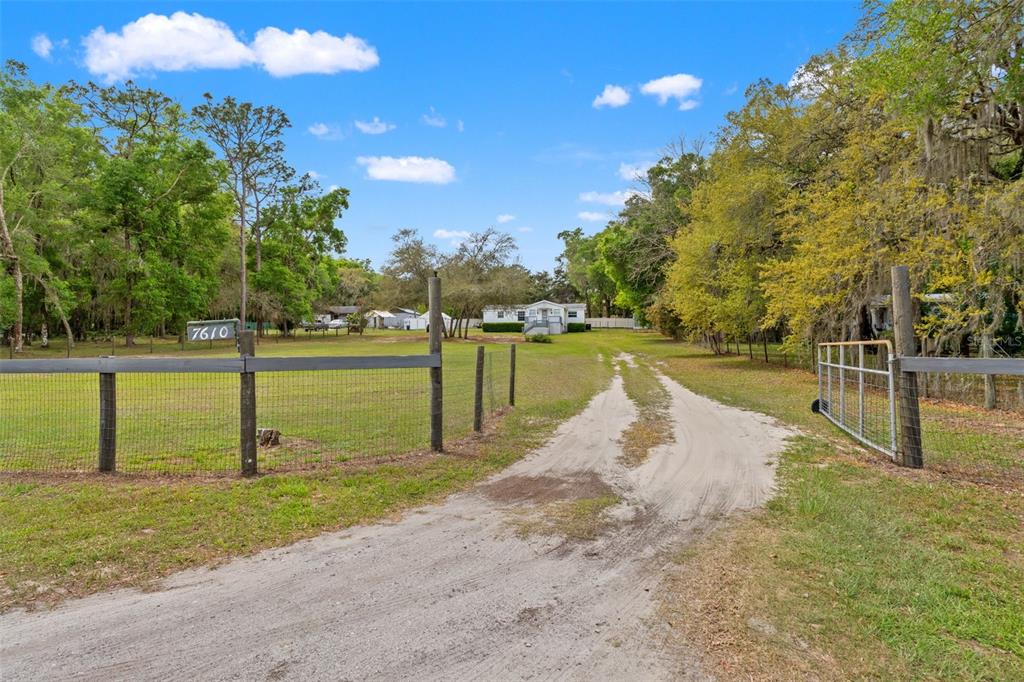 7610 County Road 663 Bushnell, FL 33513 - Photo 43 of 43 a view of a golf course with a lake