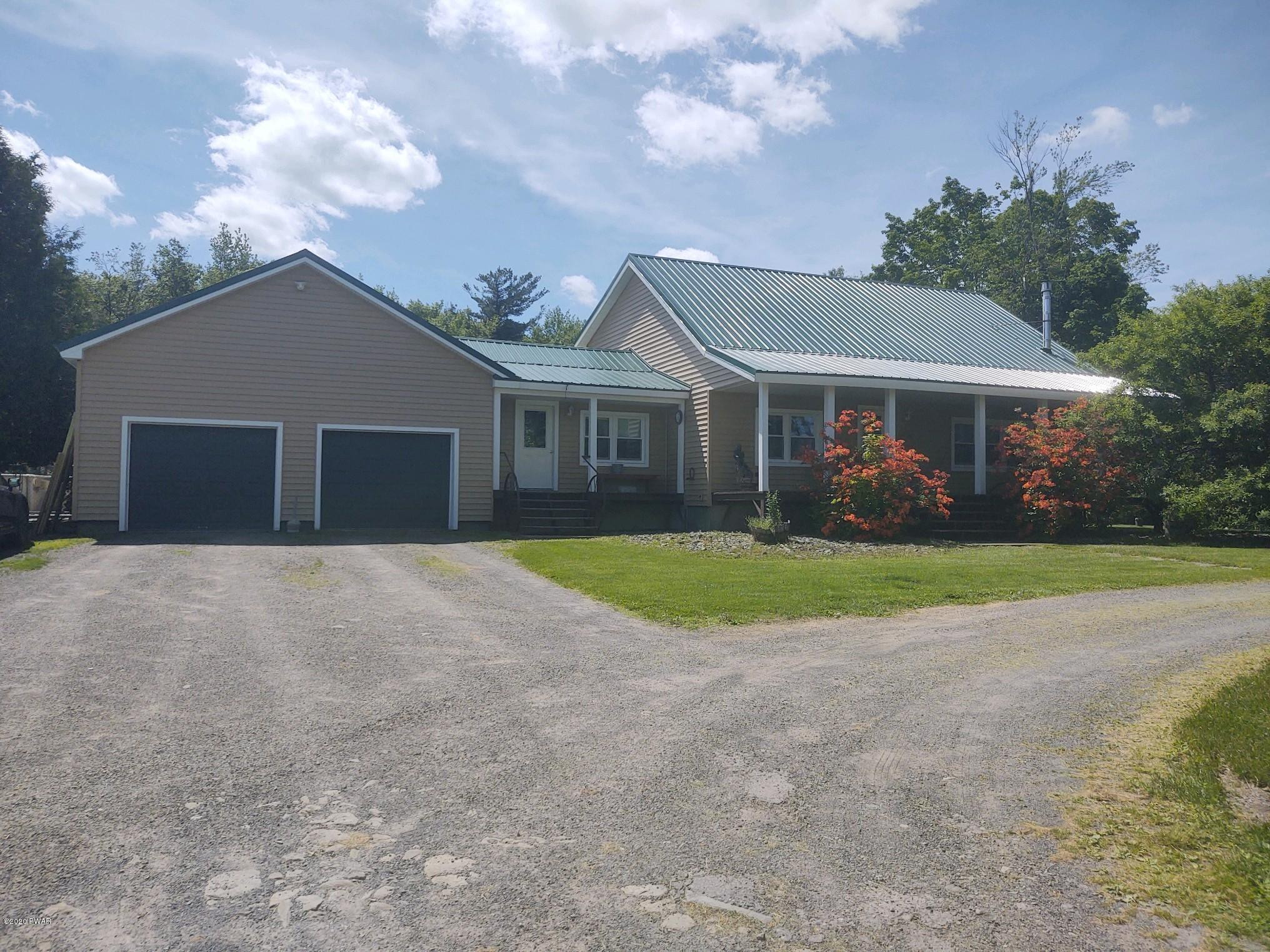 523 Cribbs Road Union Dale, PA 18470 - Photo 2 of 41 going into driveway