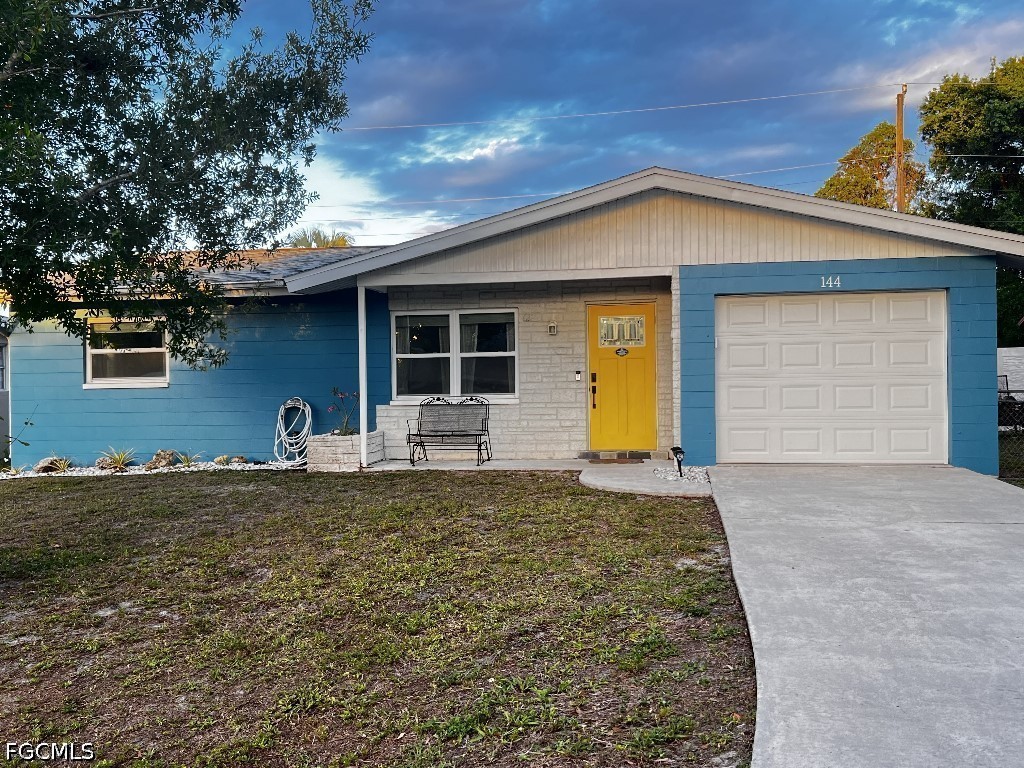 144 Whidden Road North Fort Myers, FL 33917 - Photo 1 of 16 a house view with a garden space
