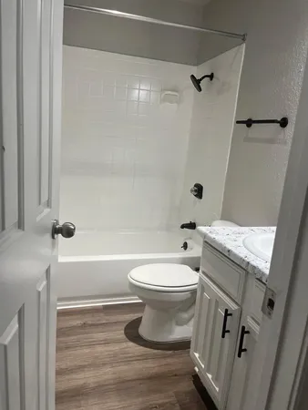 a view of a kitchen with furniture and screen