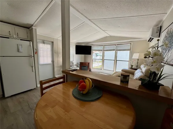 a bedroom with bed and a window