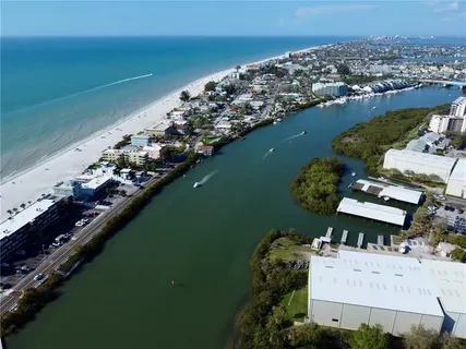 an aerial view of a house with a lake view