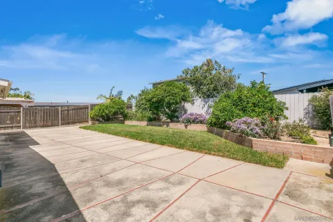 a view of a backyard with green space