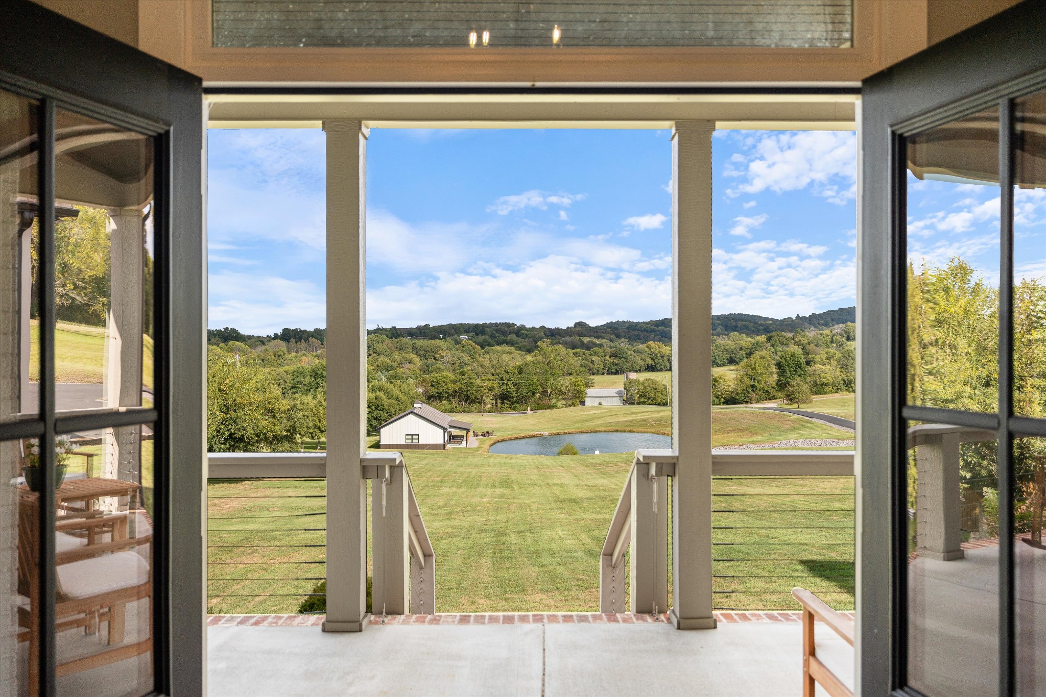 420 Fite Road Watertown, TN 37184 - Photo 21 of 76 a view of a glass door with a floor to ceiling window