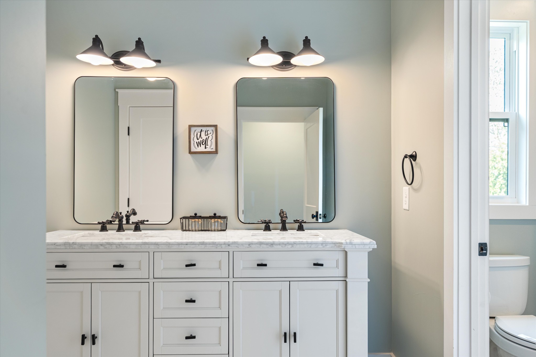 420 Fite Road Watertown, TN 37184 - Photo 40 of 76 a bathroom with a double vanity sink and a mirror