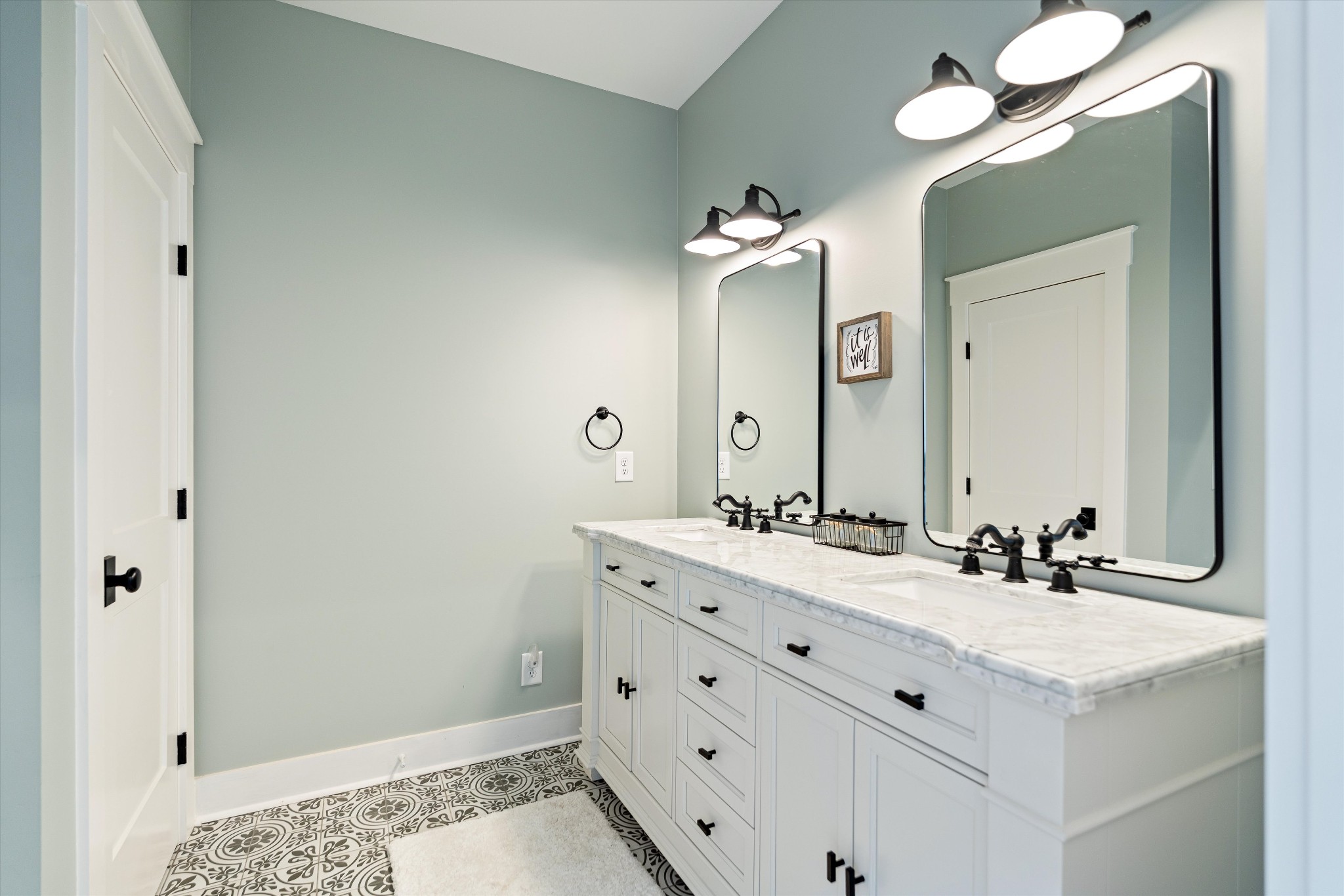 420 Fite Road Watertown, TN 37184 - Photo 41 of 76 a bathroom with a double vanity sink and a mirror