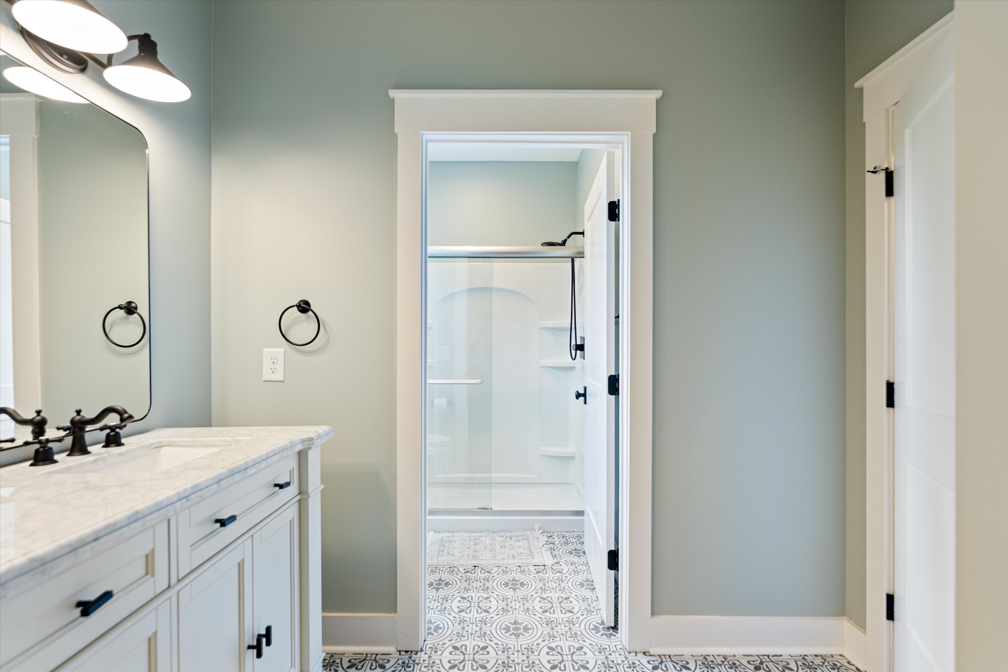 420 Fite Road Watertown, TN 37184 - Photo 42 of 76 a bathroom with a sink a light fixture and a mirror