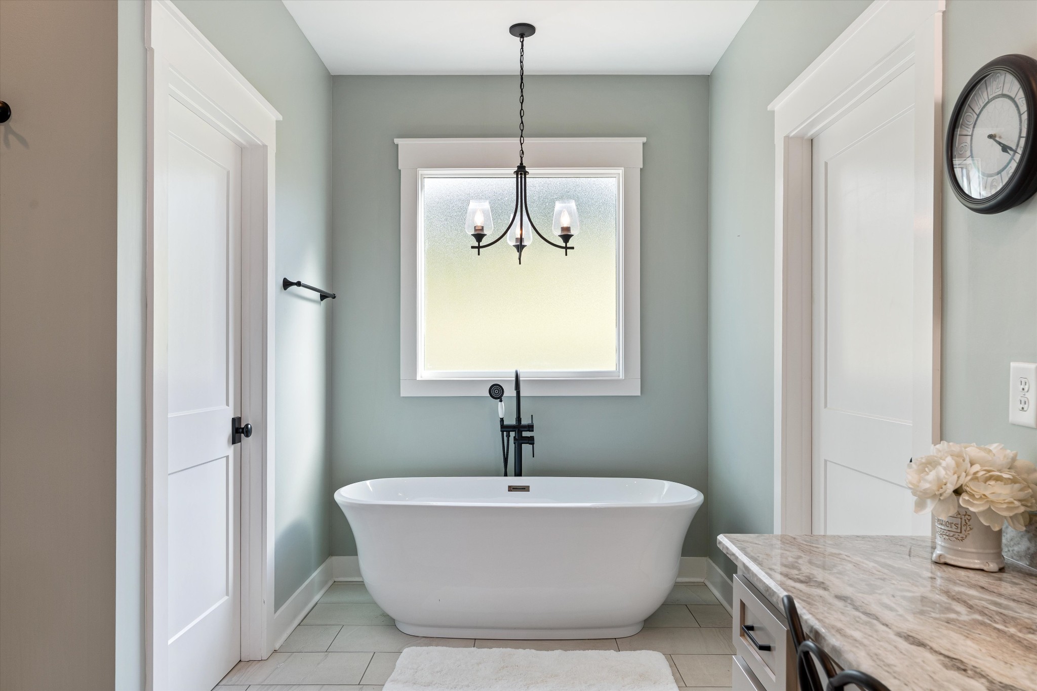 420 Fite Road Watertown, TN 37184 - Photo 47 of 76 a white bath tub sitting in a bathroom next to a window